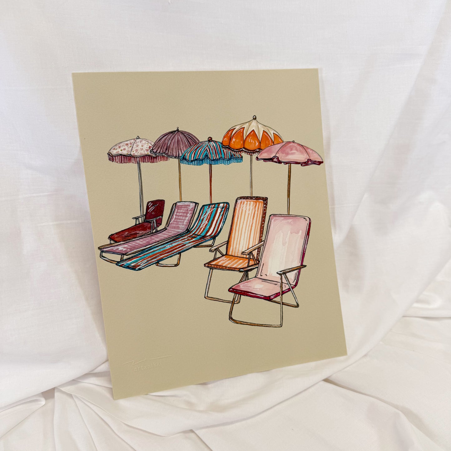 Colorful beach scene painted on a beige backgorund.