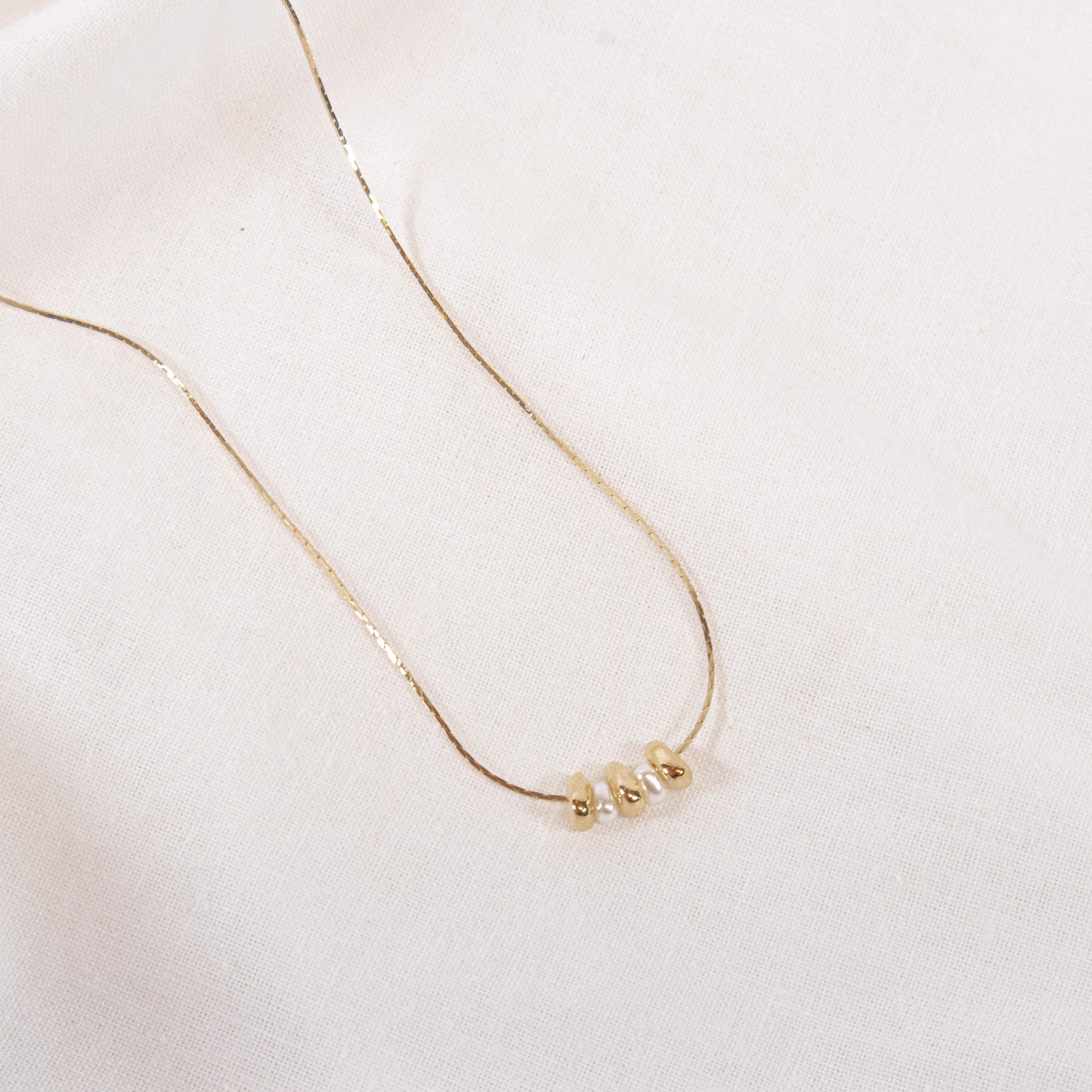 Dainty Gold And Pearl Bead Necklace