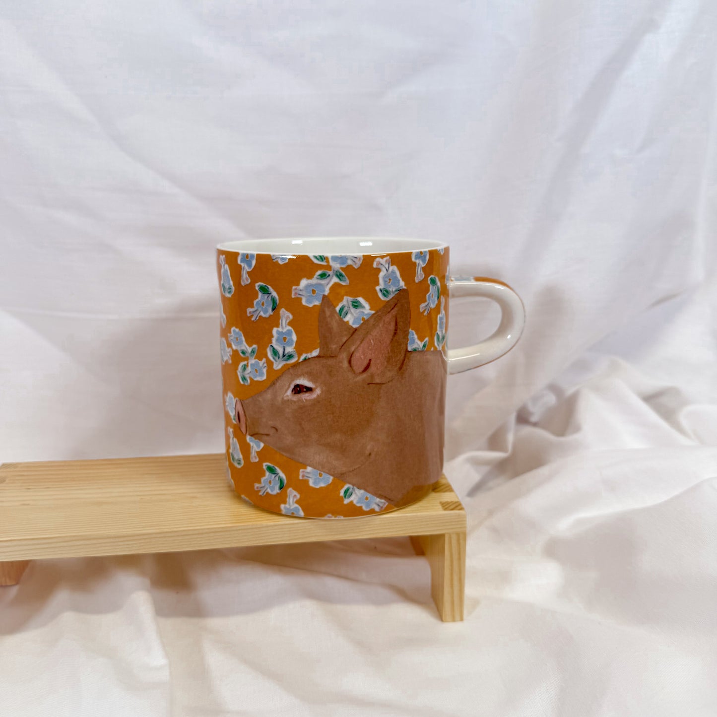 Mug with a pig design on a white background