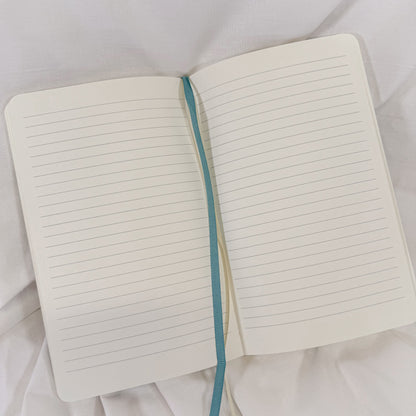 Vegan leather softcover A5 notebook in pastel blue with 192 lined sides