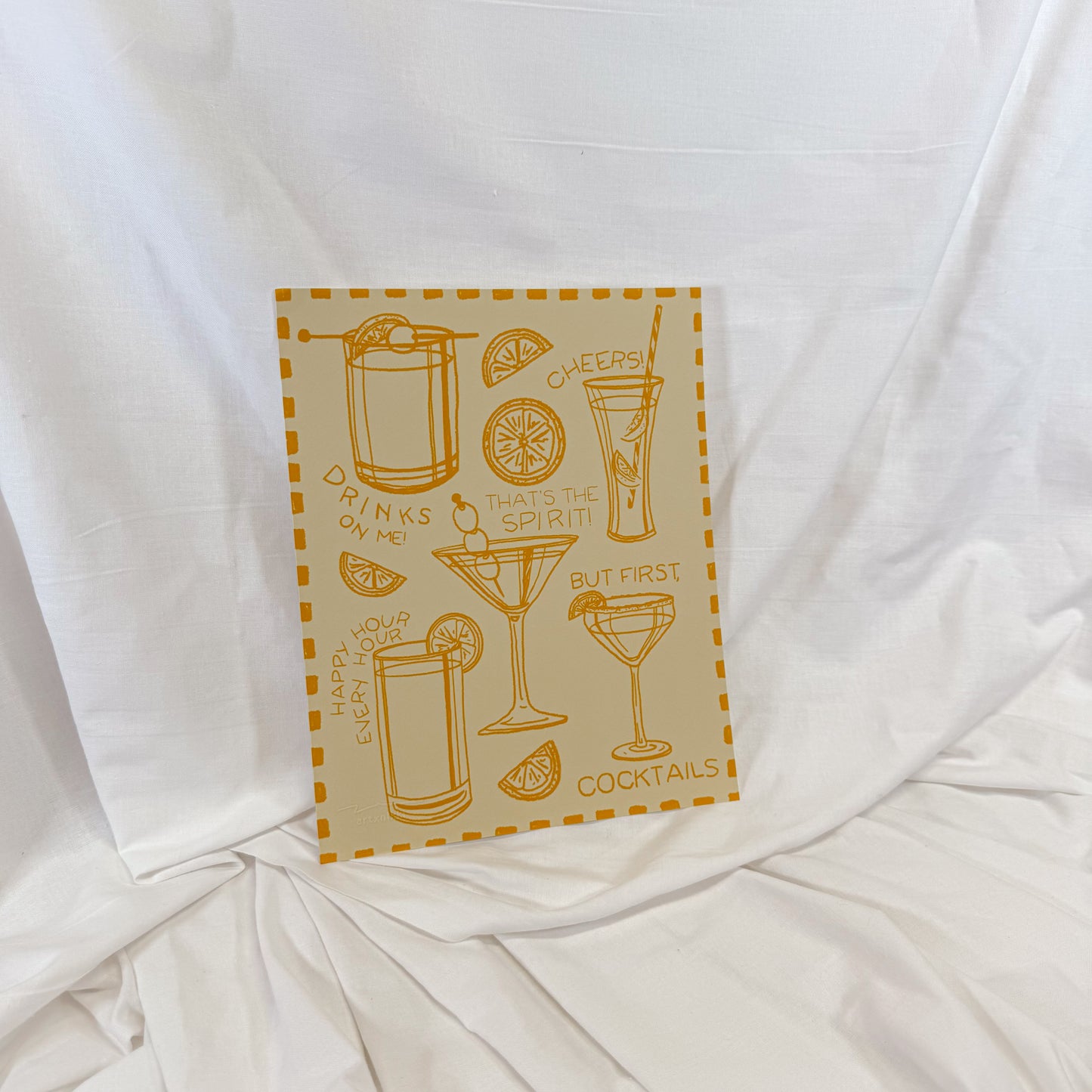 Retro cocktail illustrations on a light yellow wall art print.