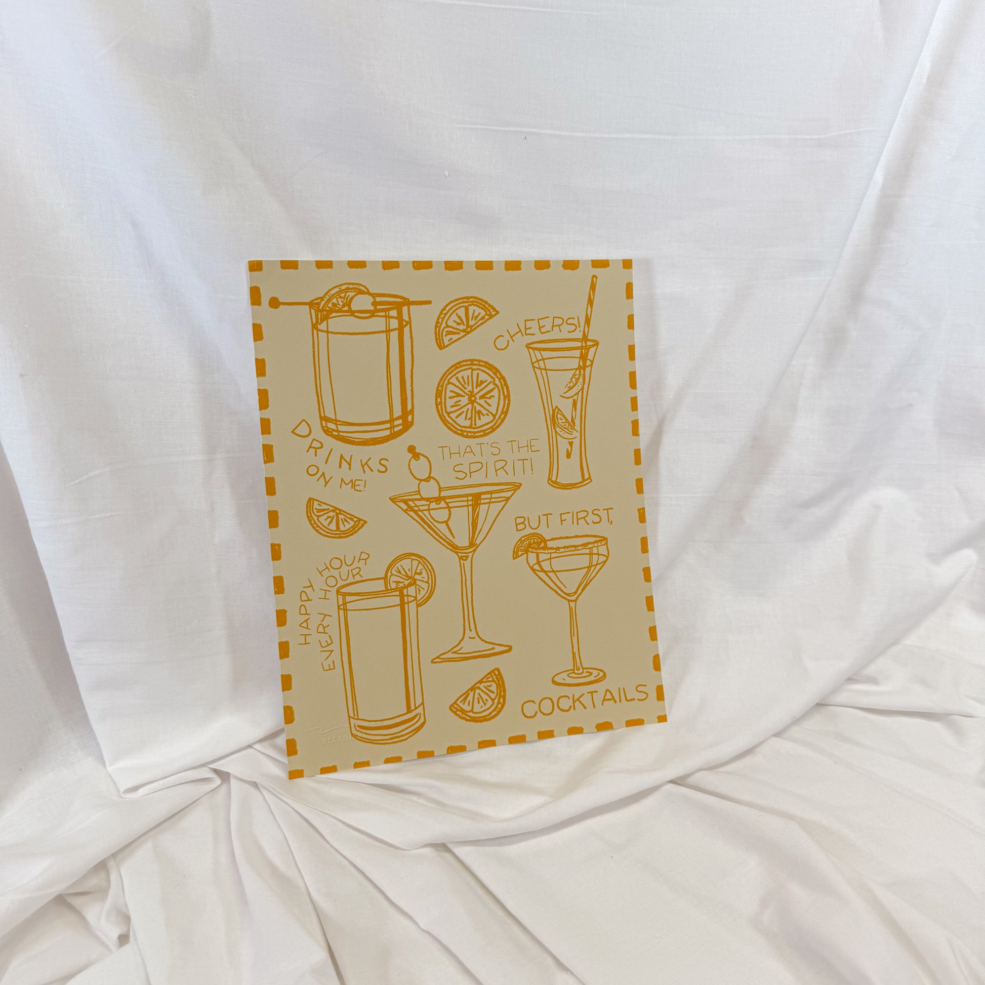 Retro cocktail illustrations on a light yellow wall art print.