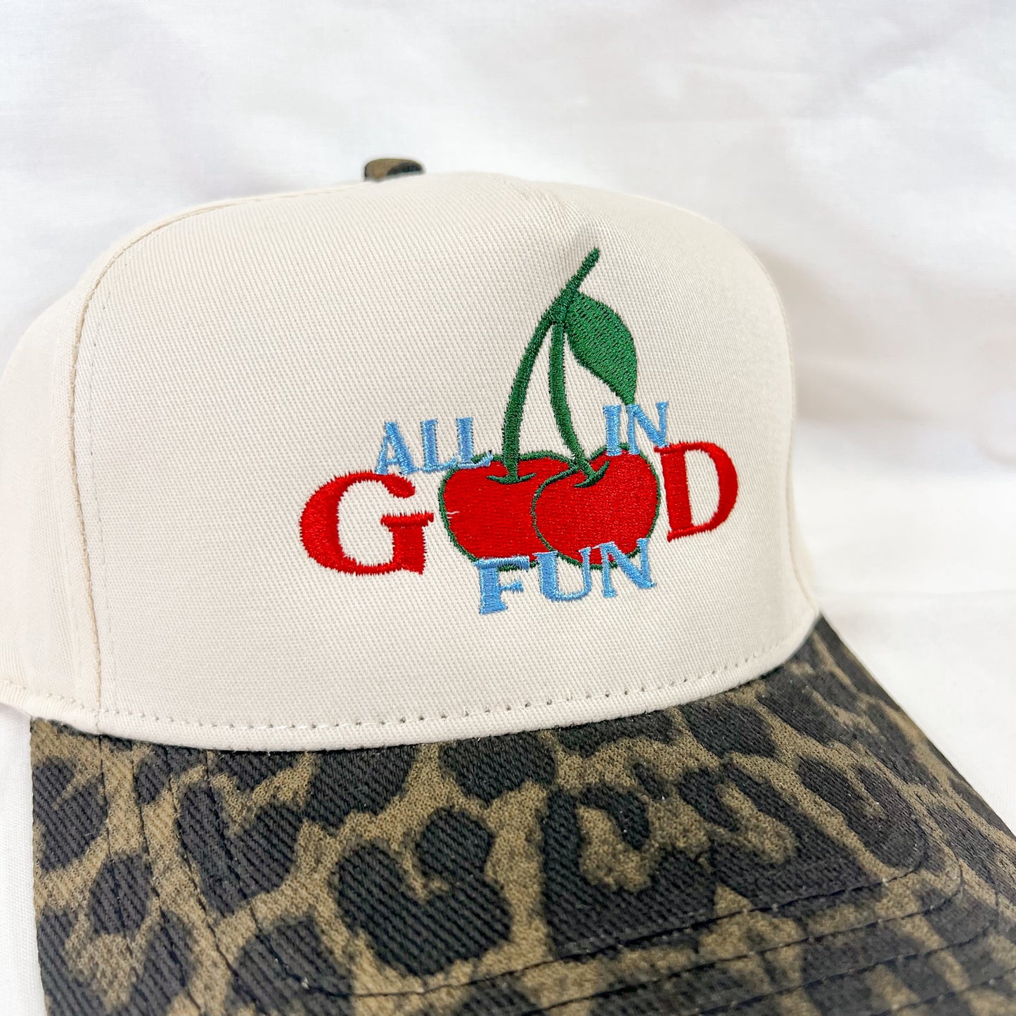 Cherry Cheetah Trucker Hat