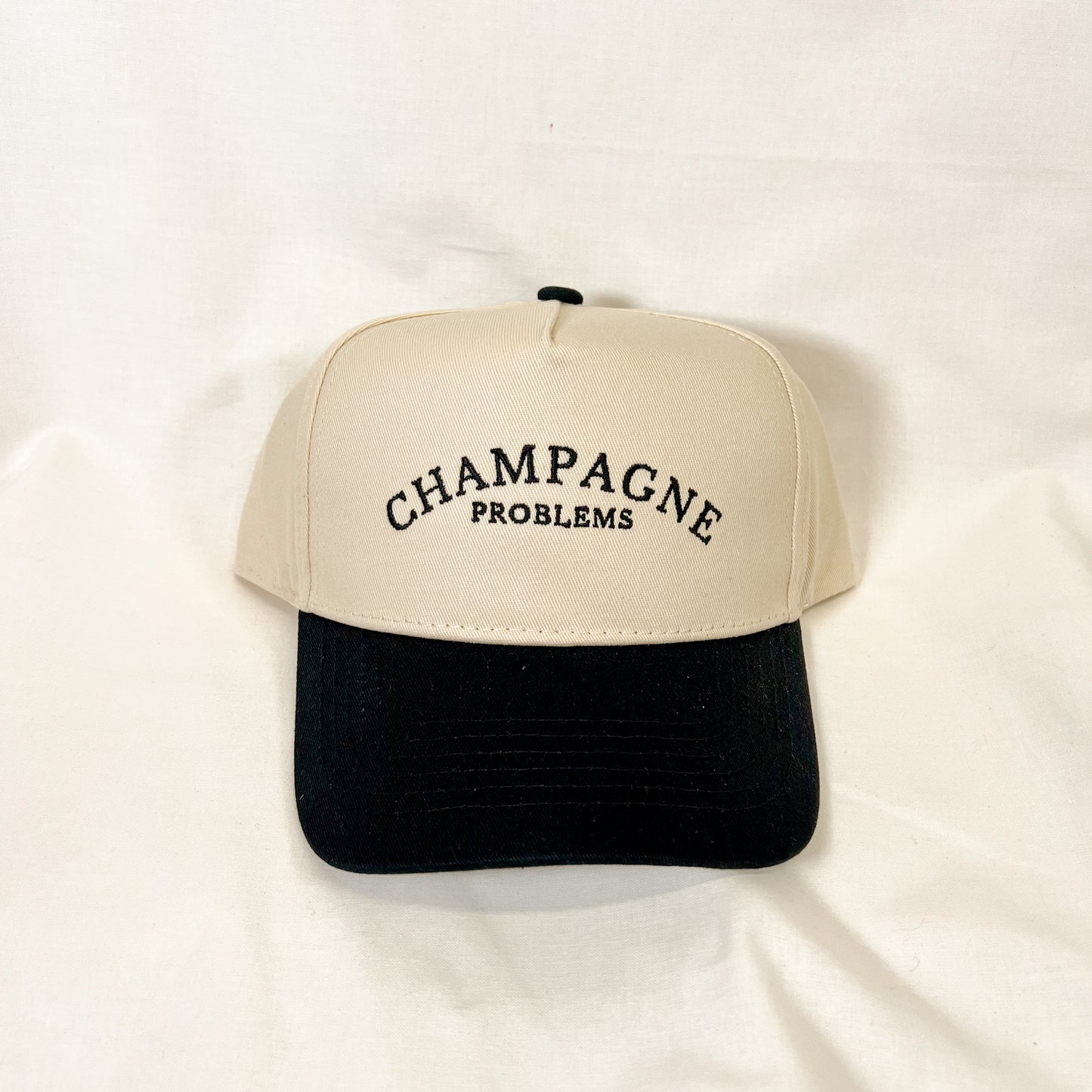 Champagne Problems Trucker Hat