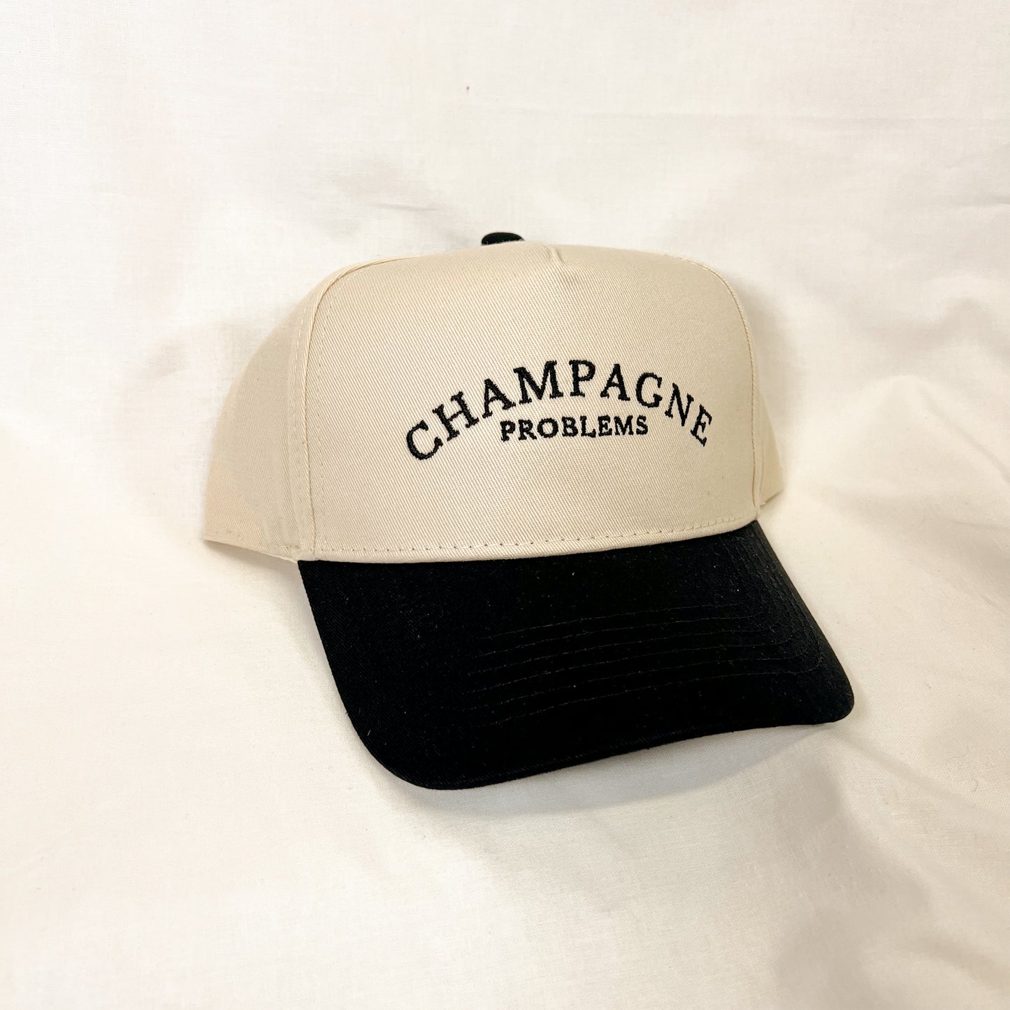 Champagne Problems Trucker Hat