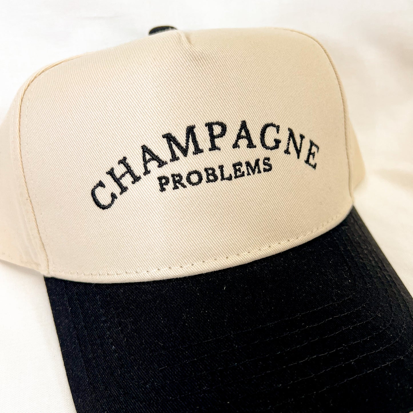 Champagne Problems Trucker Hat