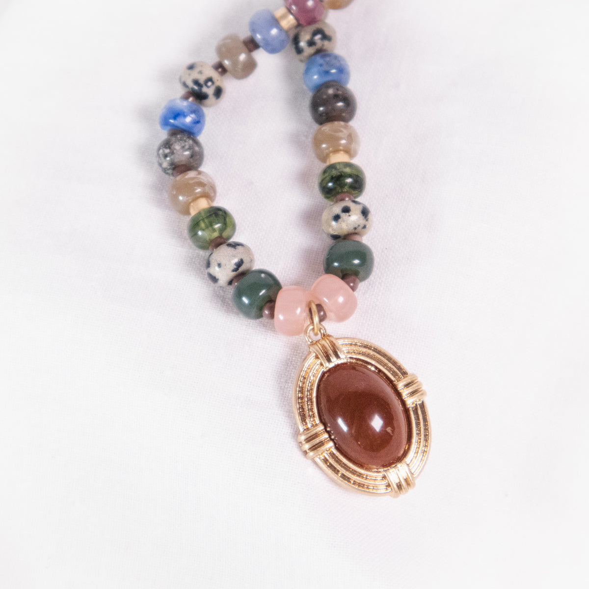 Beaded Necklace with Framed Oval Stone